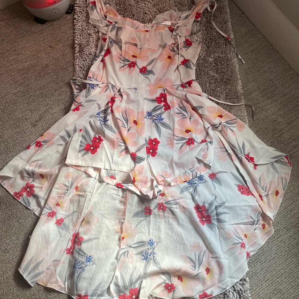 It’s a dress from DRESSFO and it’s short in the front Long in the back